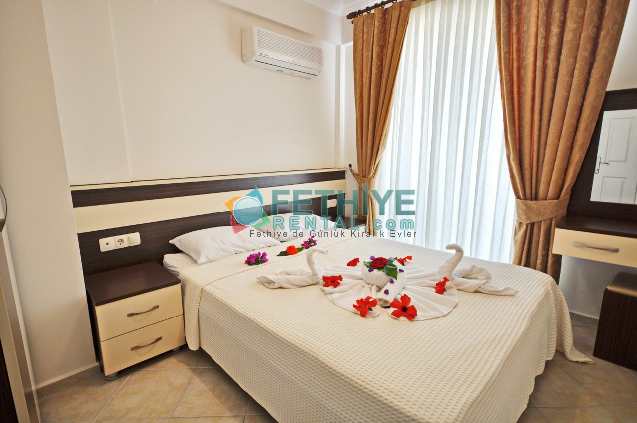 Kiralık denize sifir ev Fethiye denize sıfır eşyalı yazlık Daire